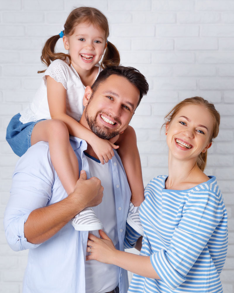 Instant Church Directory photo image of a young family smiling at the camera